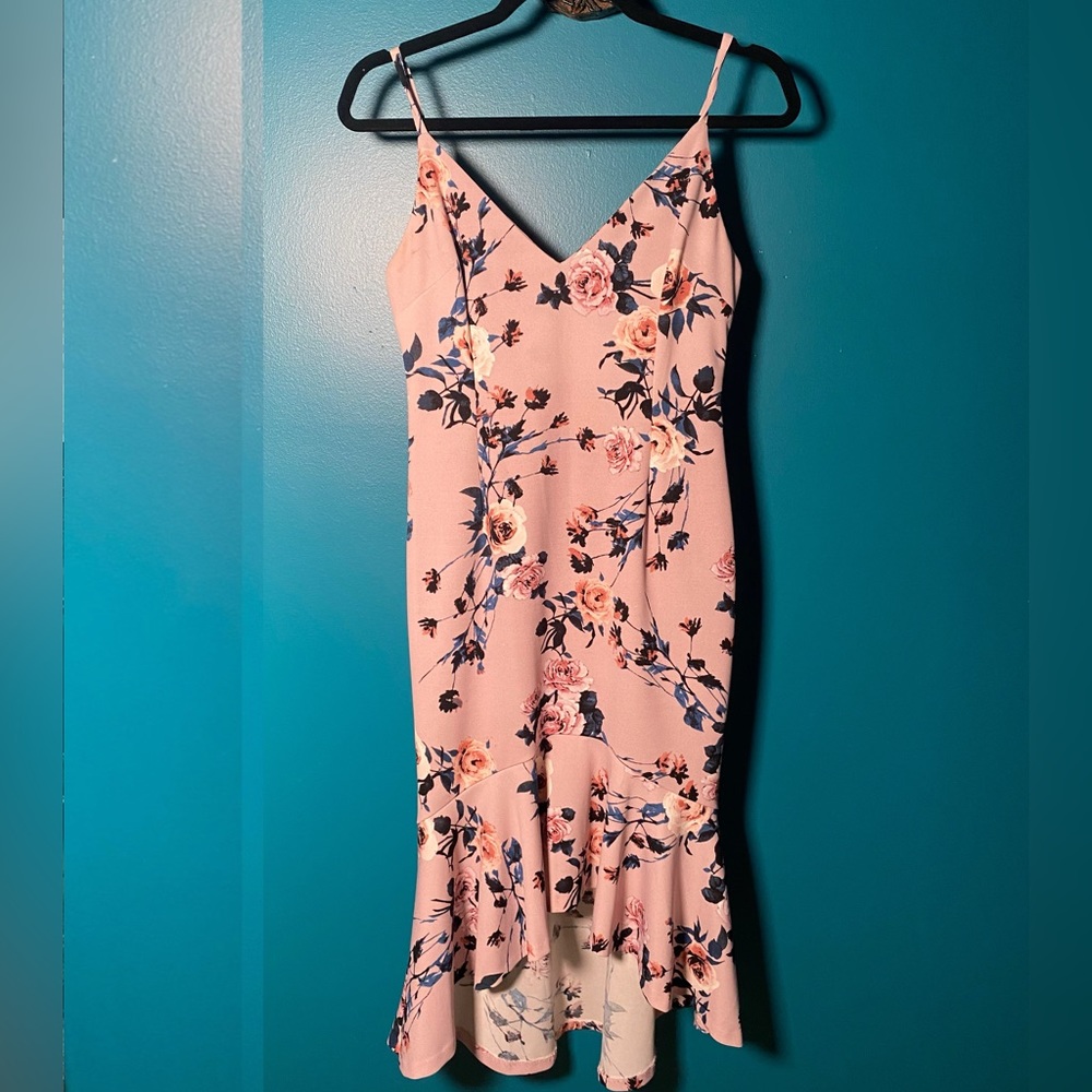 Floral body con and flirty dress with class